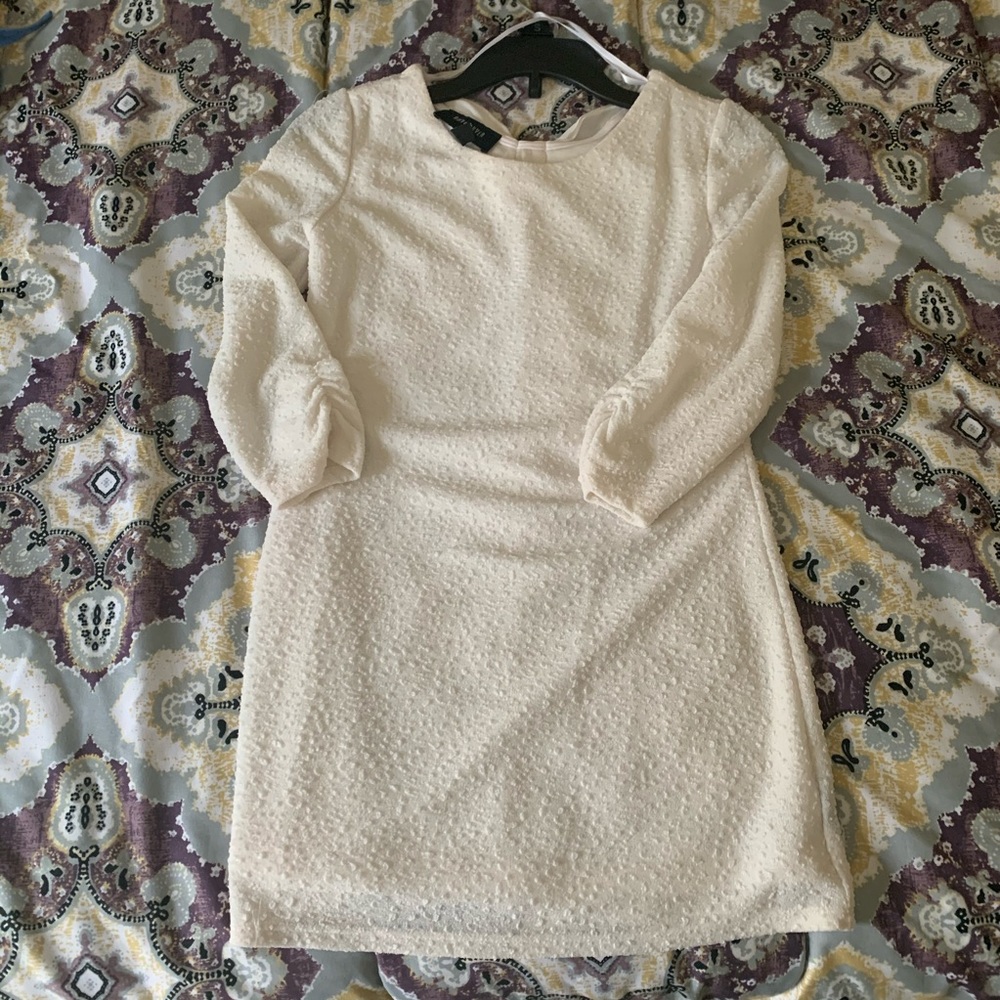 White dress with back bow detail